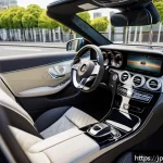 벤츠 E클래스 카브리올레의 장단점 - A sleek silver Mercedes-Benz E-Class Cabriolet cruising through a vibrant Tokyo cityscape on a sunny...